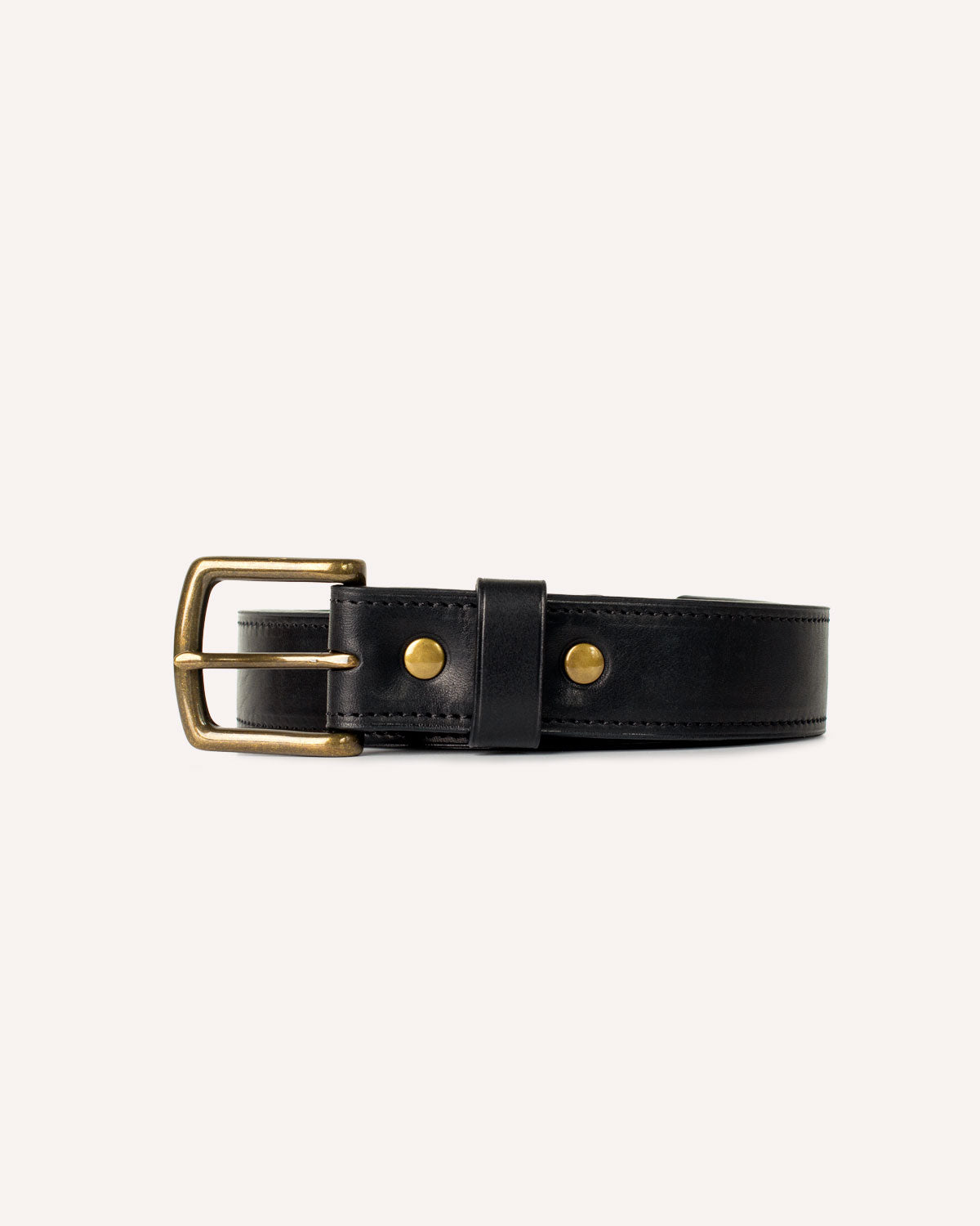 An Heirloom Belt from Archive Leather Goods, in Black Horween Dublin leather; front view of the buckle and keeper.