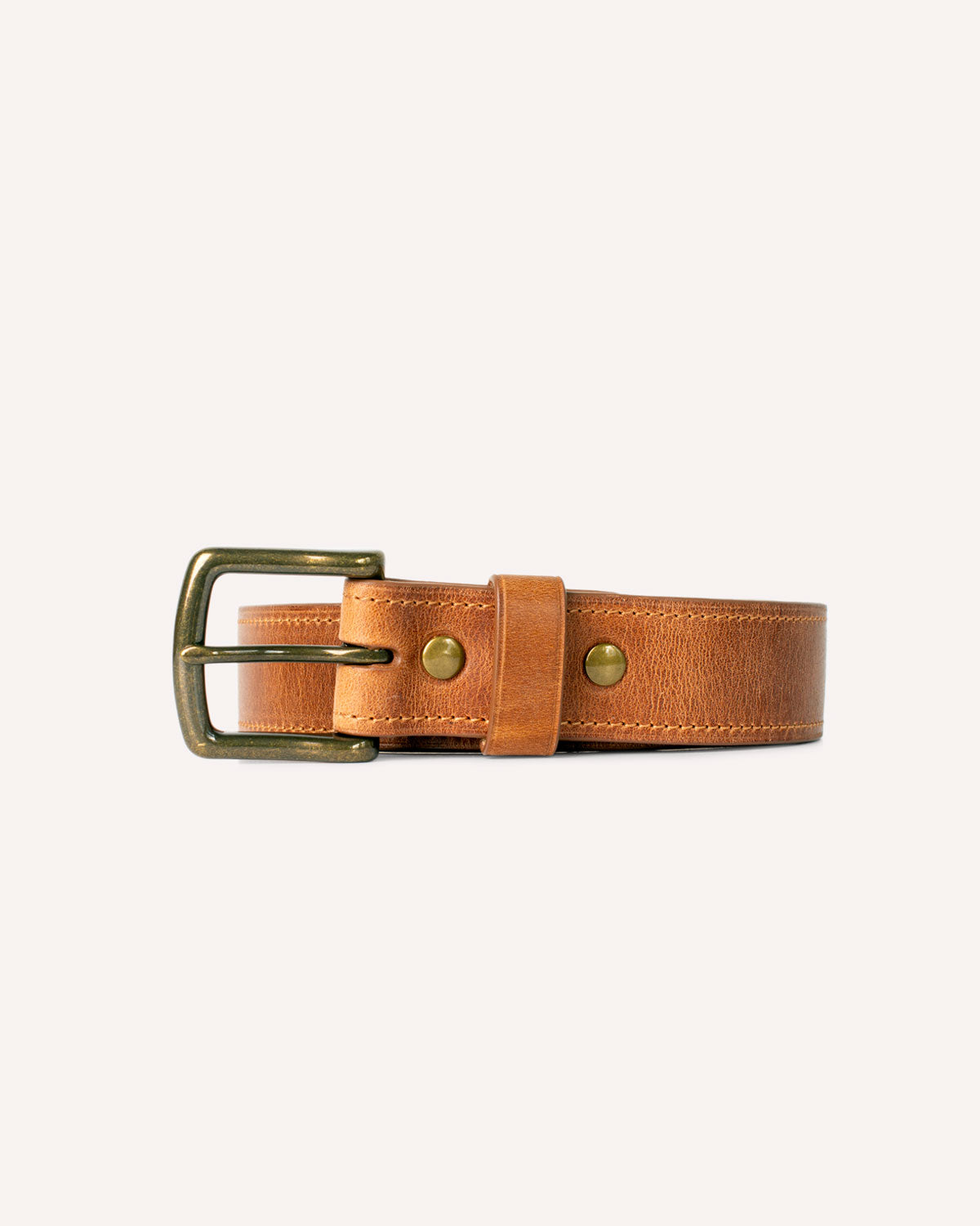 An Heirloom Belt from Archive Leather Goods, in Natural Horween Dublin leather; front view of the buckle and keeper.