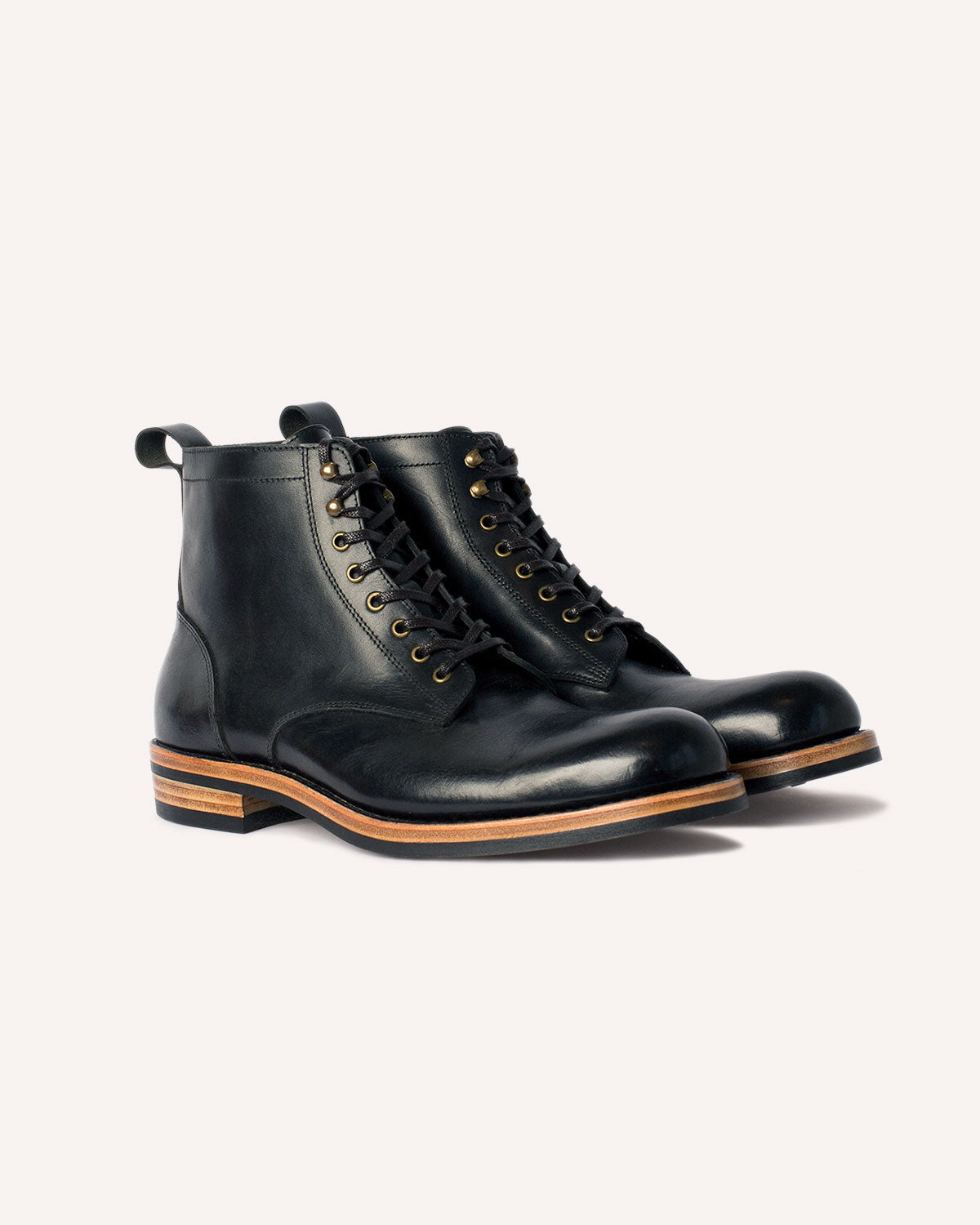 A pair of Derby Boots from Archive Leather Goods, in Black Horween Dublin leather; 3/4 view.