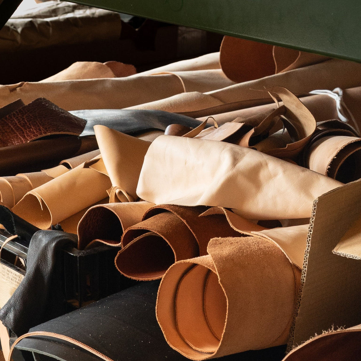 Rolls of leather hides ready for cutting.